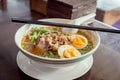 Noodle Tom Yam, hot spicy soup served with boiled egg. Royalty Free Stock Photo