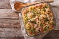 noodles baked with ham and cheese close-up in a baking dish. horizontal top view Royalty Free Stock Photo
