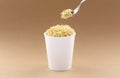 Noodles cup with fork  mockup template for design uses on brown background Royalty Free Stock Photo