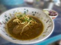 Food noodles curry and crisp noodles with side dish