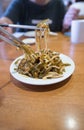 Noodles with hand chopsticks Royalty Free Stock Photo