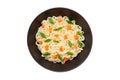 Noodles instant cooked with vegetables carrot and green onion dark bowl, top view isolated on white background with clipping path Royalty Free Stock Photo