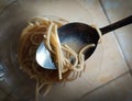 Noodles with long strands when spooned Royalty Free Stock Photo