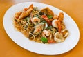 noodles plate with spaghetti pasta stir fried with vegetables herb spicy tasty appetizing asian noodles mix seafood stir fried Royalty Free Stock Photo