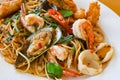 noodles plate with spaghetti pasta stir fried with vegetables herb spicy tasty appetizing asian noodles mix seafood stir fried Royalty Free Stock Photo