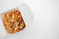 Noodles with pork in take-out box. Free space for text Royalty Free Stock Photo