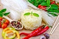 Noodles rice different with peppers and vegetables on sacking Royalty Free Stock Photo