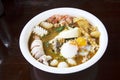 noodles tom yam soup thai style with pork and seafood and soft-boiled egg Royalty Free Stock Photo