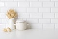Noodles and wheat ears near cooking pot on kitchen table Royalty Free Stock Photo