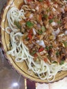 Noodles in Xinjiang are called `stripes`.