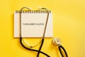 NORADRENALINE - next to a stethoscope on a yellow warm background