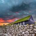Nordic church and graveyard under dramatic sky Royalty Free Stock Photo