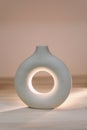 Nordic design ceramic vase. modern original designer flower vase isolated on beige background