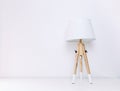 Nordic lamp for three wooden legs on a white background Minimalist