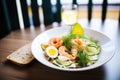 nordic shrimp salad, boiled egg halves, asparagus, rye toast