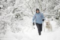 Nordic walking with dog Royalty Free Stock Photo