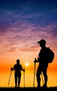 Nordic walking silhouette at sunset Royalty Free Stock Photo