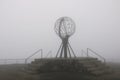 The Nordkapp North Cape globe symbol on a foggy day