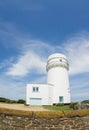 Norfolk coastline, lighthouse and blue skies Royalty Free Stock Photo