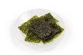 Nori seaweed snack on white dish on white background Royalty Free Stock Photo