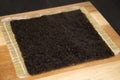 Nori seaweed on sushi bamboo mat. Kitchen still life