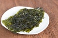 Nori sheet dried seaweed, Crispy seaweed on plate.