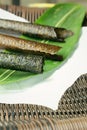 Nori sheets and roll. Royalty Free Stock Photo