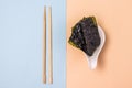 Nori Sheets with Sticks for Sushi Yellow and Blue Background Horizontal Japanese Snack Top View Royalty Free Stock Photo