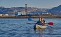 Norilsk, Russia - June 20, 2017: a guy and a girl floating on a kayak