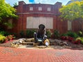 Norm the Niner statue at UNC Charlotte with a Recording King Banjo Royalty Free Stock Photo