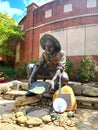 Norm the Niner statue at UNC Charlotte with a Recording King Banjo Royalty Free Stock Photo