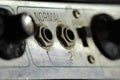 Normal 1, 2. Macro of controls of vintage 19060s. Retro style guitar amplifier with rust and dirt Royalty Free Stock Photo