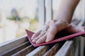Normal view of a woman`s hands sanding a window frame before painting. Empowered woman concept Royalty Free Stock Photo
