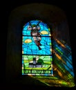 NORMANDY, FRANCE - July 4, 2017: Stained glass window in the Church Saint-CÃÂ´me-et-Saint-Damien Angoville-au-Plain, with