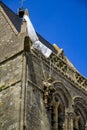 Normandy, France; 4 June 2014: The soldier landed on the steeple of the church of Sainte Mere Eglise