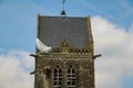 Normandy, France; 4 June 2014: The soldier landed on the steeple of the church of Sainte Mere Eglise