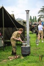 Normandy, France; 4 June 2014: View of recreation camp in Normandy for the 70th anniversary with vehicles, tents and people