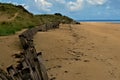 Normandy World War Two landing beaches. Utah Beach in Normandy region of France showing weathered wood fence, dunes with Royalty Free Stock Photo