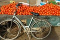 Morocco. Taroudant. A bicycle leaning against a tomato stand