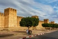 Morocco. Taroudant. Women walking front of the city walls