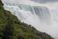 North America Tourists explore Destination Niagara Falls on the US Canadian Border Boats Tour Royalty Free Stock Photo
