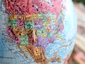 North America USA focus macro shot on globe map for travel blogs, social media, website banners and backgrounds. Royalty Free Stock Photo