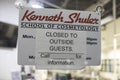 Kenneth Shuler closed sign close up