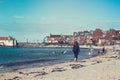 North Berwick beach and tourists walking on the sand, East Lothian