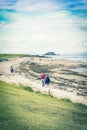 North Berwick beach and tourists walking on the sand, East Lothian