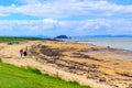 North Berwick beach and tourists walking on the sand, East Lothian