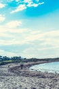 North Berwick beach and tourists walking on the sand, East Lothian