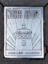 North Bridge Metal Name Plaque on Chicago Sidewalk