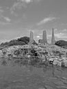 North Dakota Relic Monument Man-made Towers with stream on bright sunny day Grayscale