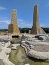 North Dakota Relic Monument Man-made Towers with stream on bright sunny day